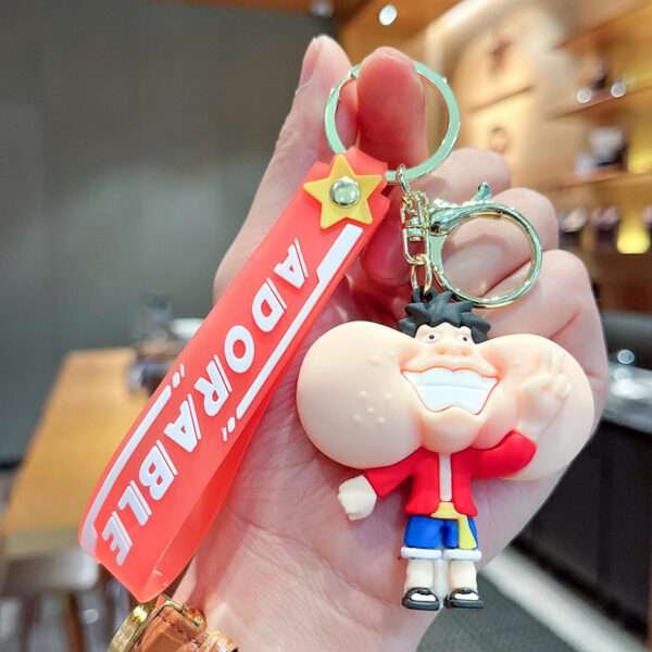 a key chain with a cartoon character on it