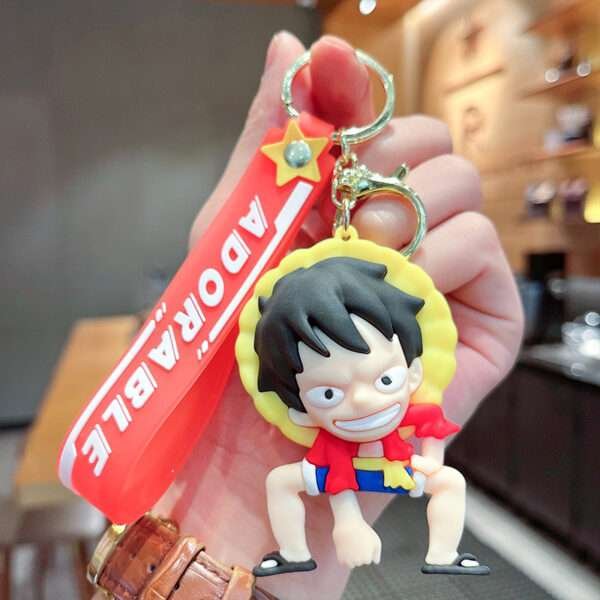 a key chain with a cartoon character on it