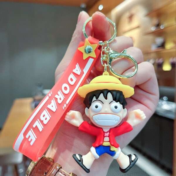 a key chain with a cartoon character on it